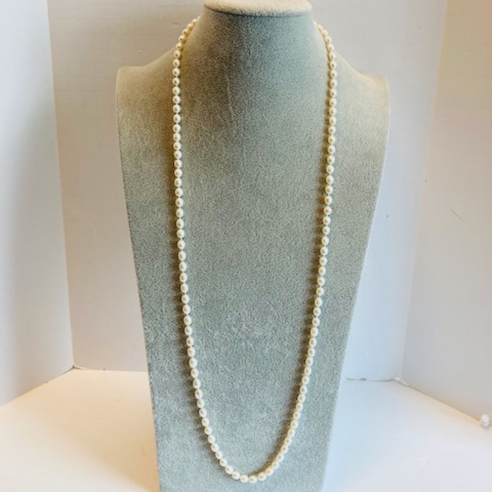 Estate hand knotted natural pearl 34" necklace.